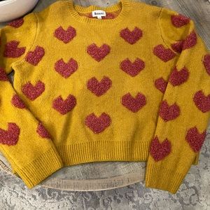 THE cutest Valentine’s sweater! ♥️ Tan sweater with red hearts size large.